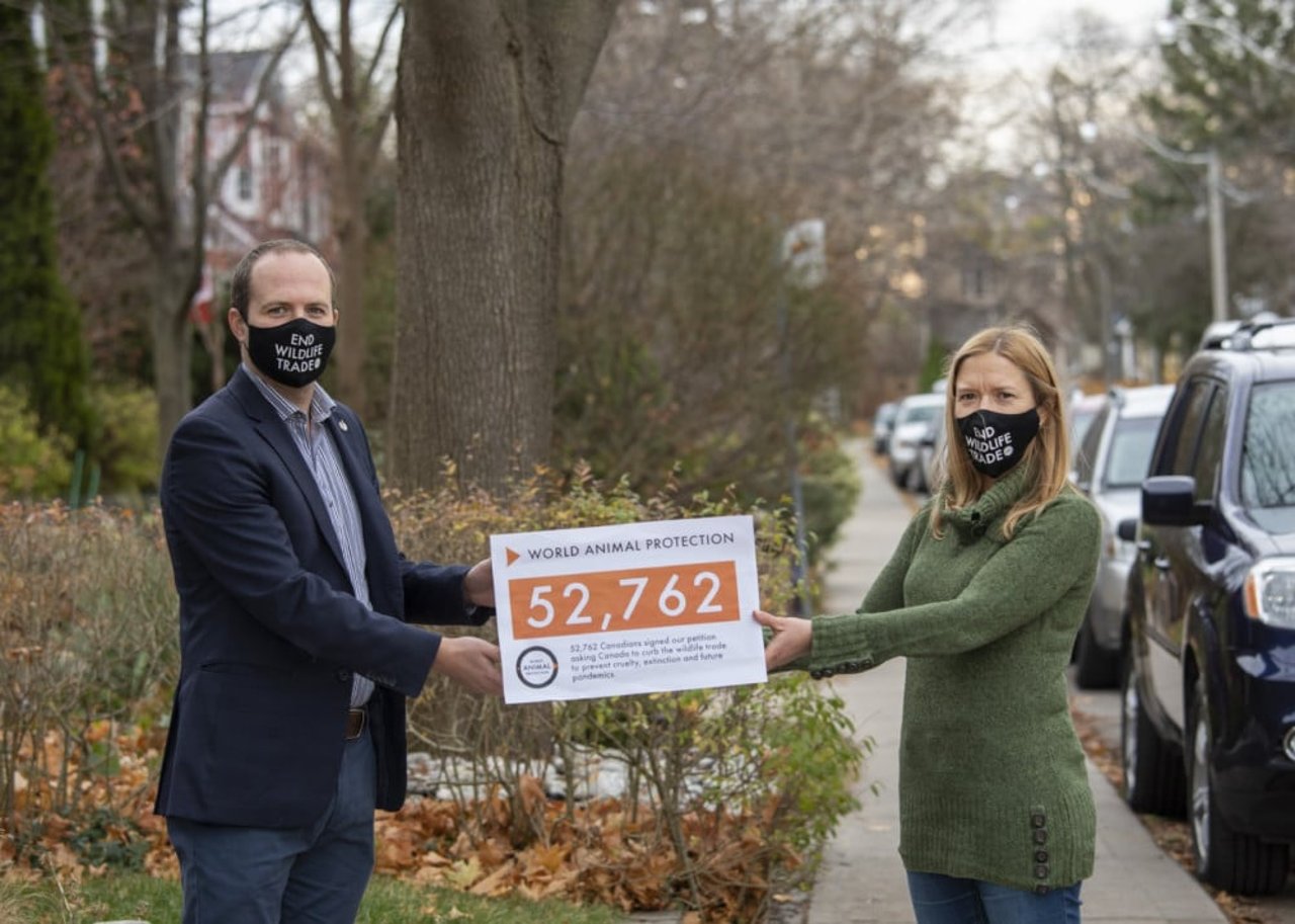Canadian MP Nathaniel Erskine-Smith accepting Canadian petition signatures from our Campaign Director Melissa Matlow