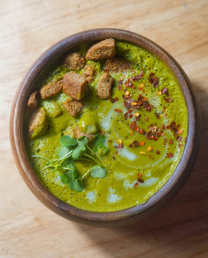 A bowl of green soup