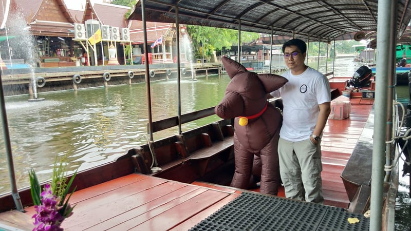 Inflatable dog on a boat in Thailand - World Animal Protection - Animals in disasters