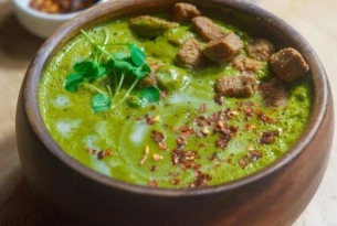 A bowl of green vegan soup