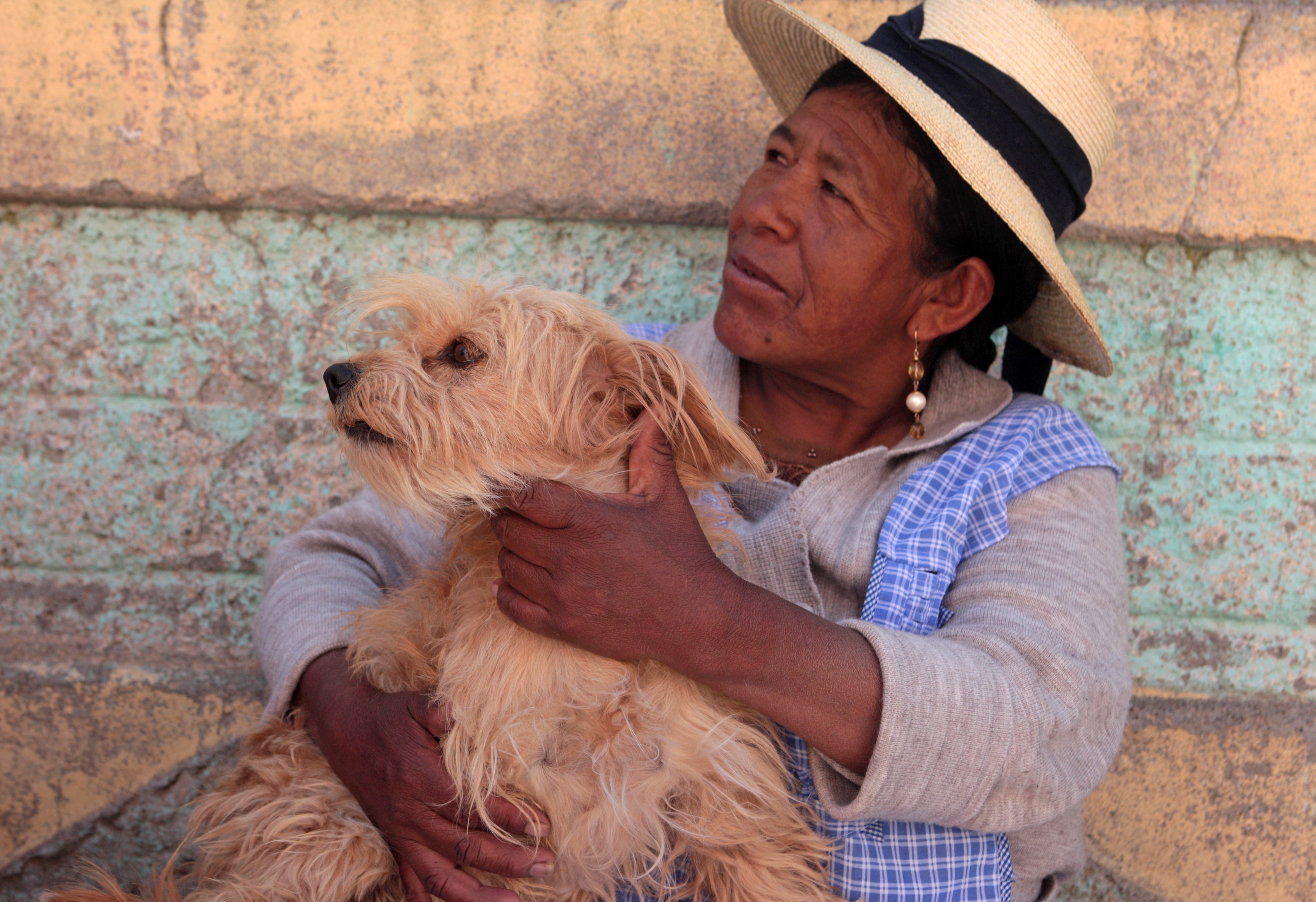 Herlinda and Luna, her dog. Puno, Perú. World Animal Protection has been giving a workshop to local school teachers on dog bite prevention.