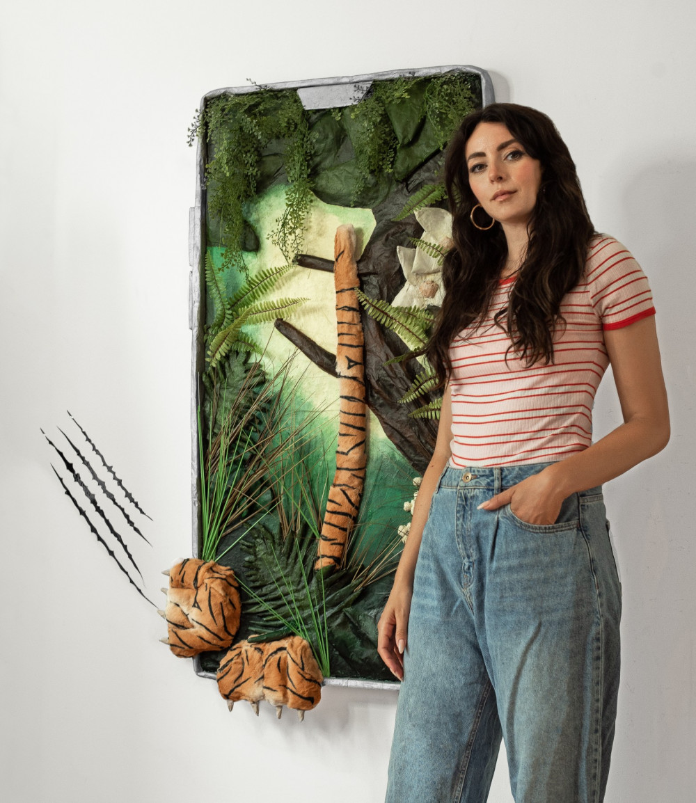 Mixed media artpiece by Briony Douglas of a tiger trying to escape a selfie phone frame