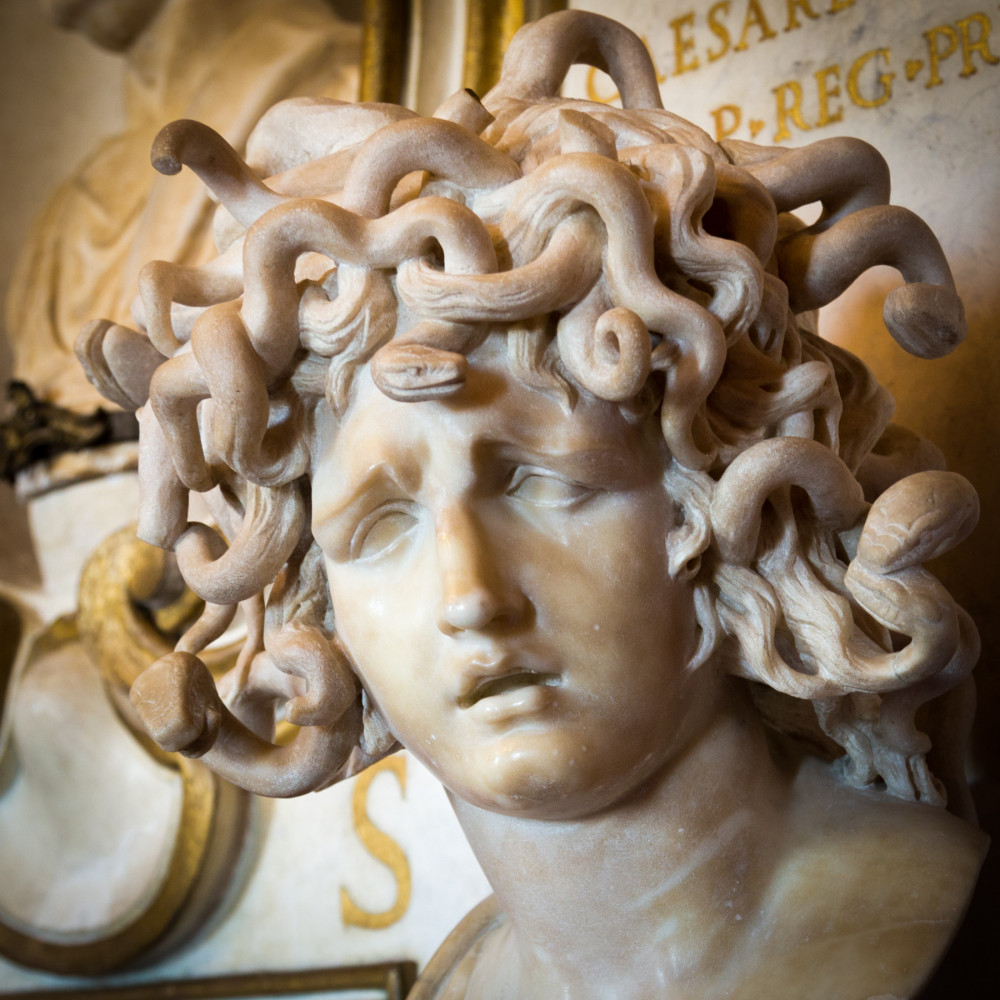 A statue of Medusa with snake-hair